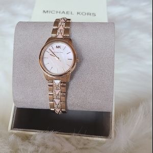 NEW Michael Kors style 6586-rose gold. Retail $275
